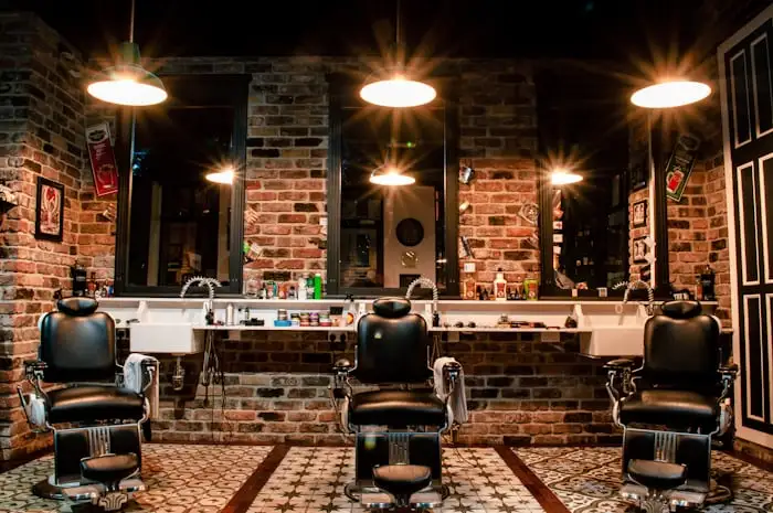 Barber chair against a brick wall