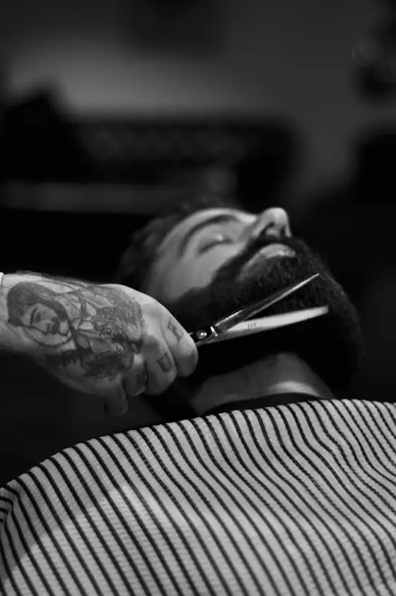 Beard being trimmed
