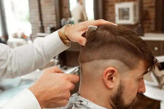 Barber cutting hair
